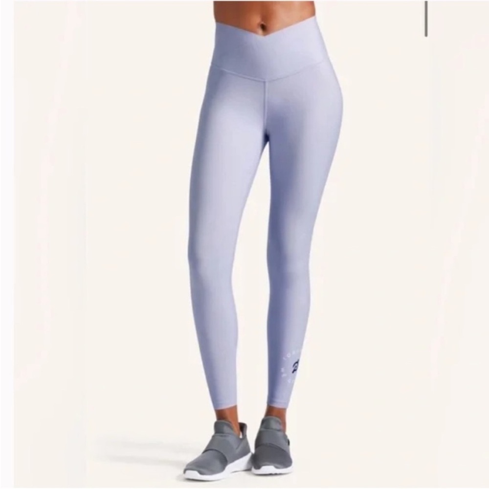Peloton criss cross front Cadent leggings in light lavender.
